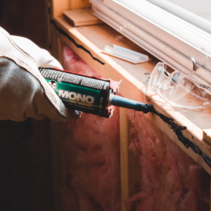 Man working on house repairs